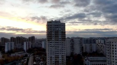 Drone video. Sunset over Moscow. Dolly zoom effect. High building.