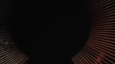 Copper computer heatsink. A lot of dust. Dolly slider extreme close-up inside. Laowa Probe