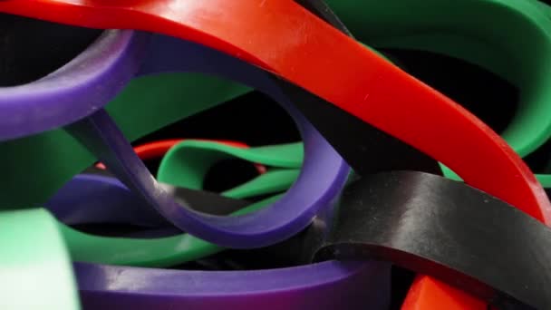 Multi Colored Sports Fitness Elastic Bands Dolly Slider Extreme Close — Video Stock