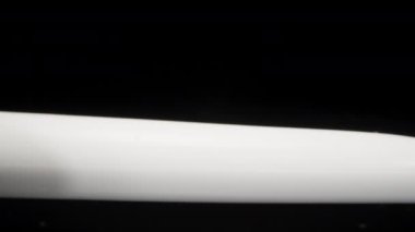 Squeezing toothpaste on a toothbrush. Dolly slider extreme close-up. Laowa Probe