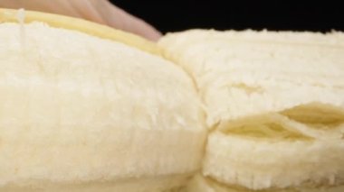 Peeling a banana. Dolly slider extreme close-up. Laowa Probe