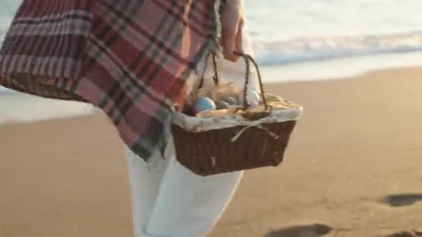 Girl Walks Beach Sunset Carrying Basket Easter Eggs Walking Sun — ストック動画