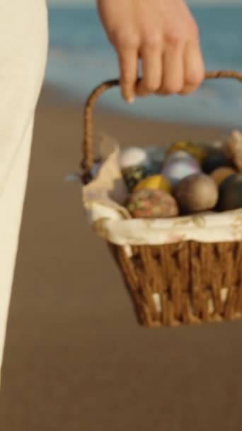 Girl Walks Basket Easter Eggs Sea Beach Sunset Rear View — Vídeos de Stock