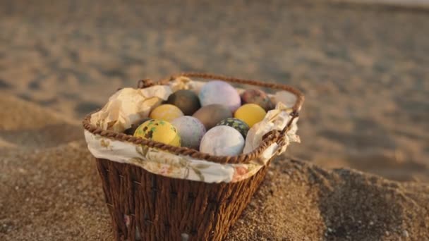 Basket Easter Eggs Sand Sea Waves Background Sun Already Setting — Stock video