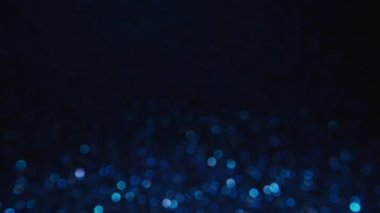 Blue bokeh circles, shimmer. Macro footage.