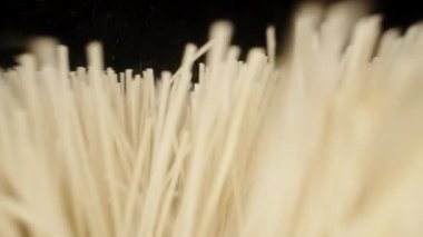 Wooden brush, for bath. Dolly slider extreme close-up inside. Laowa Probe