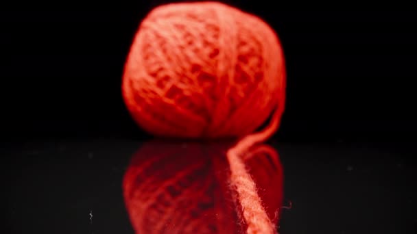 Ball Red Woolen Threads Black Glass Dolly Slider Extreme Close — Vídeos de Stock