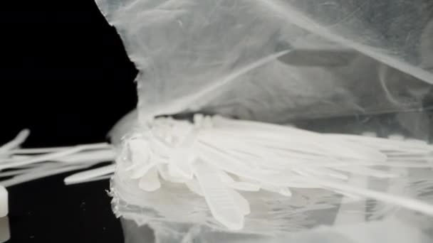 White Nylon Cable Ties Bag Dolly Slider Extreme Close Laowa — стоковое видео