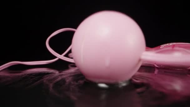 Pink Vibrating Balls Sex Toy Splashing Water Dolly Slider Extreme — Vídeo de Stock