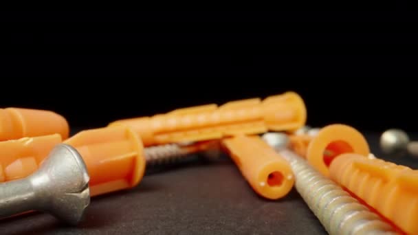 Self Tapping Screws Orange Plastic Wall Plugs Dolly Slider Extreme — Vídeo de Stock