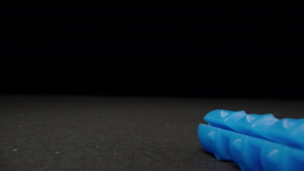 Blue Plastic Wall Plugs Black Table Dolly Slider Extreme Close — Vídeo de Stock
