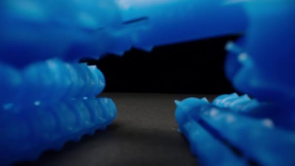 Blue Plastic Wall Plugs Black Table Camera Them Dolly Slider — стоковое видео