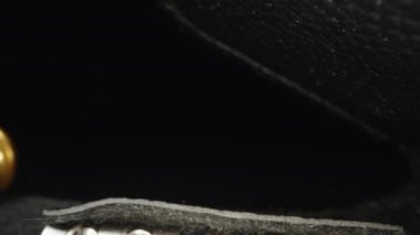 A set of small screwdrivers for the watch. Dolly slider extreme close-up. Laowa Probe