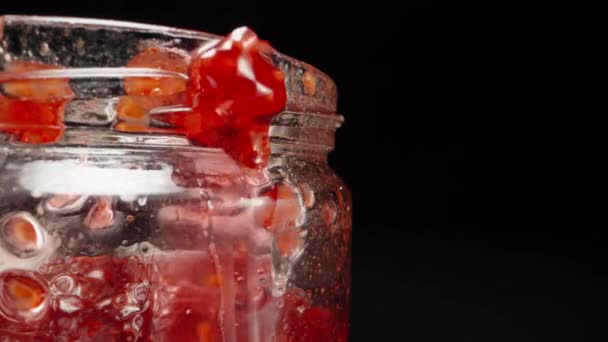 Jar Raspberry Jam Flowing Jar Macro Shot — Stock Video