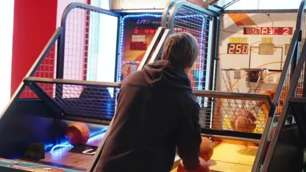 Man Playing Amusement Park Throws Balls Basket — Stock Video