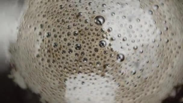 Coffee Foam Bubbles Spin Cup Camera Zooms Out Macro Shooting — Vídeos de Stock