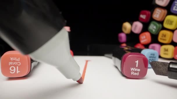 Multi Colored Markers Table Red Marker Draws Straight Line Paper — Vídeo de Stock