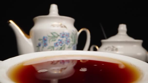 Throw Piece Sugar Cup Tea Splashes Slow Motion Dolly Slider — Stockvideo