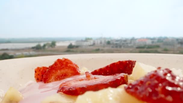 Breakfast Open Sky Balcony Sunny Morning Toss Strawberry Chunks Yogurt — Stockvideo