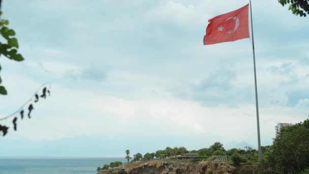 Flag Turkey Flies Wind Sea Rocks Background — Stockvideo