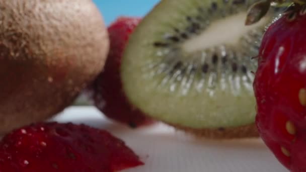 Red Green Jelly Pieces Kiwi Strawberries Eat Green Jelly Spoon — Stock Video