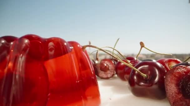 Red Jelly Cherries Tap Jelly Spoon Shakes Close — Stock Video