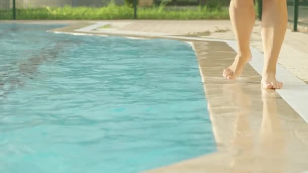 Young Woman Walks Edge Pool Legs Close Sunny Day Slow — Stock Video
