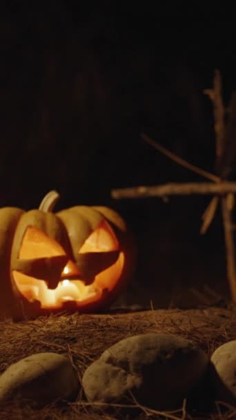 Vertical Video Halloween Pumpkin Grave Surrounded Stones Night Motion — Stock Video