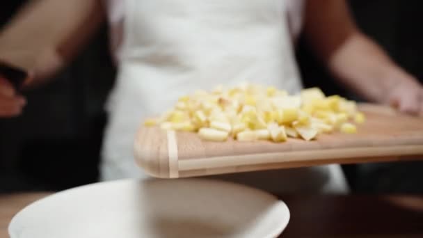 Young Woman White Apron Shifts Sliced Quince Board Plate View — Stock Video