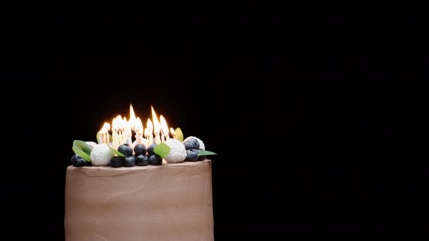 Chocolate Cake Blueberries Lighted Candles Young Woman Blows Out Candles — Stock Video