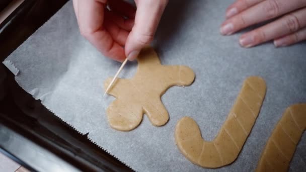 Using Wooden Toothpick Woman Creates Patterns Gingerbread Dough Candy Cane — Stock Video