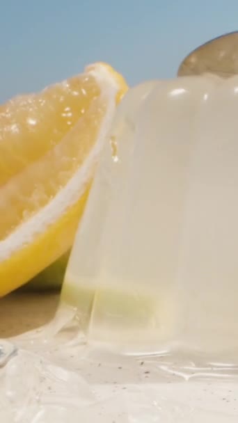 Lemon Jelly Plate Lemon Slices Tap Spoon Shakes Vertical Social — Stock Video
