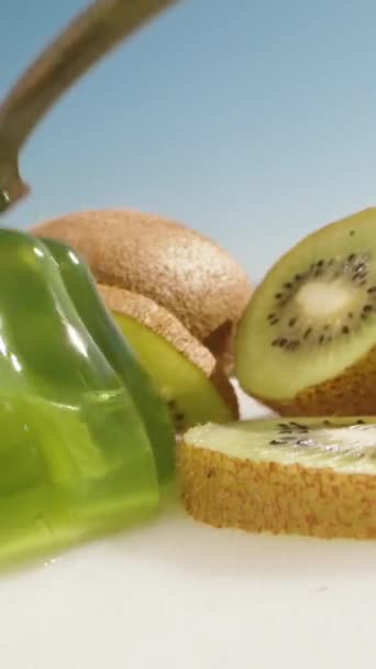 Green Jelly Kiwi Pieces Hit Spoon Shakes Vertical Social Media — Stock Video