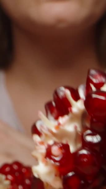 Extreme Close Young Woman Eating Slice Pomegranate Vertical Video Social — Stock Video