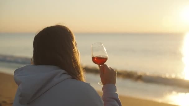 Lonely Young Woman White Hoodie Meets Sunrise Seshore Drinks Wine — Stock video