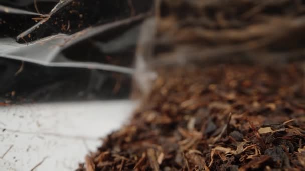 Suszone Liście Czarnej Herbaty Przezroczystej Torbie Suwak Makro Dolly — Wideo stockowe