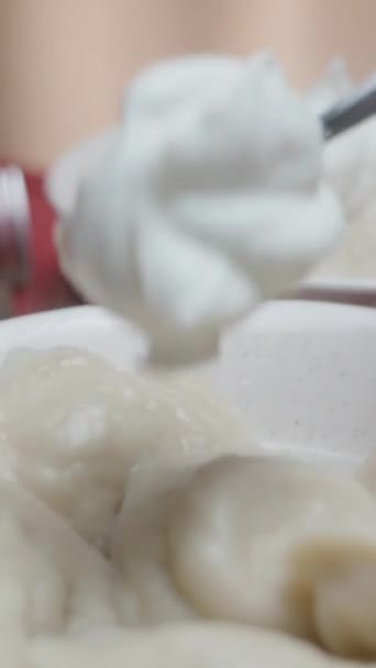Put Spoonful Sour Cream Hot Homemade Dumplings Close Slow Motion — Stock Video