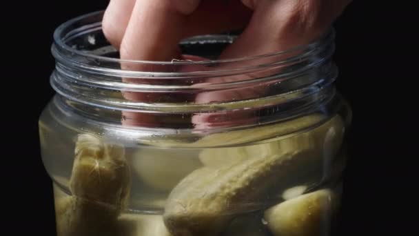 Jar Pickles Rotates Black Background Take Out One Cucumber — Stock Video