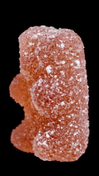 Gummy Candy Shape Bear Dusted Sugar Rotates Black Background Isolated — Stock Video