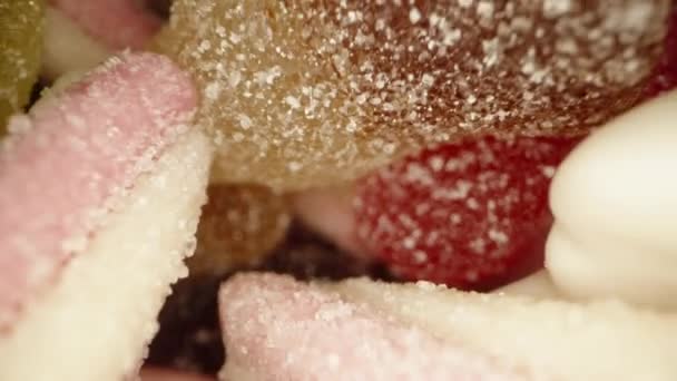 Camera Quickly Ascends Glass Assorted Gummy Candies Dusted Sugar Dolly — Stock Video