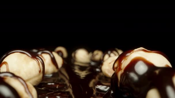 Hazelnut Covered Liquid Chocolate Dark Chocolate Tile Camera Gliding Nuts — Stock Video