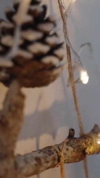Vertical Video Woman Wrapping Garland Lanterns Homemade Installation Made Branches — Stock Video