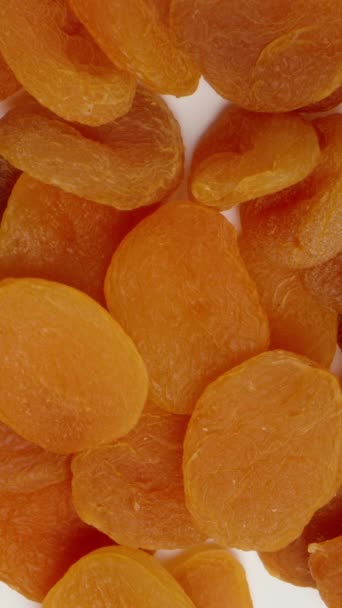 Vertical Video Take One Dried Apricot Common Pile Bring Close — Stock Video
