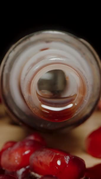 stock-video-vertical-video-pomegranate-sauce-drips