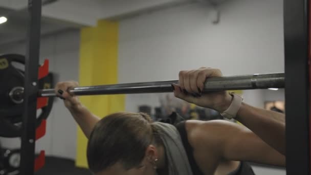 Young Woman Gym Takes Barbell Weights Placing Her Shoulders She — Stock Video