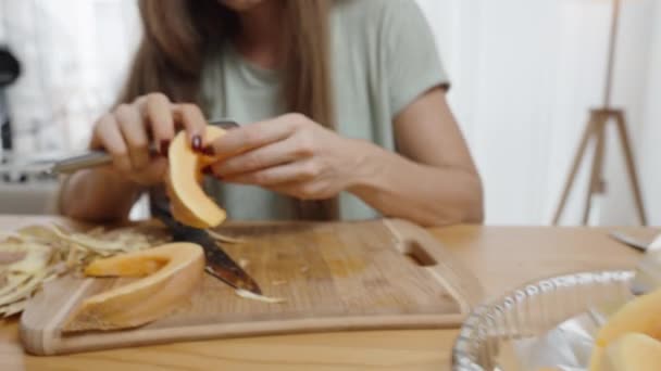 Woman Peels Skin Pumpkin Special Vegetable Knife — Stock Video