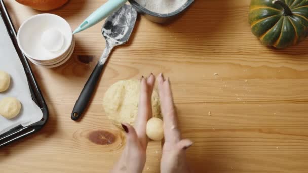 Top View Woman Rolls Dough Balls Places Them Baking Sheet — Video