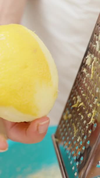 Woman Grates Lemon Zest Metal Grater Pressing Zest Bowl Ingredients — Stock Video