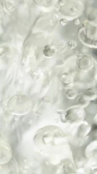 Vídeo Vertical Miles Gotas Aceite Agua Burbujas Aire Sobre Fondo — Vídeo de stock