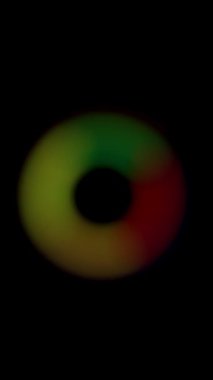 Gökkuşağı Renklerinde Bulanık Dairesel Yükleme Animasyonu, ilerlemeyi gösteren kırmızı, yeşil ve sarı tonlarla yumuşak, dağınık bir etki gösterir.